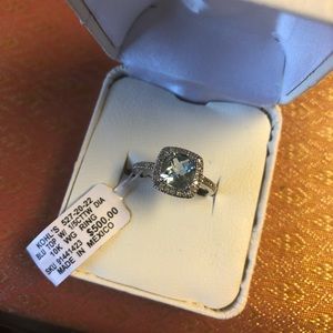 White gold ring light blue blue topaz size 7